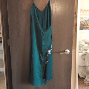 Deep green wrap dress with slit and flower embroidery